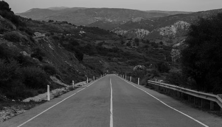 vertical view of empty mountain road on cyprus, march 2020