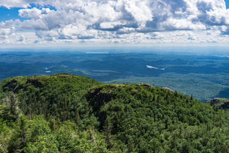 View on Saguenay on a summer day from the top of Pic de la Hutte, a peak located in Monts Valin National Park (Quebec, Canada)の写真素材