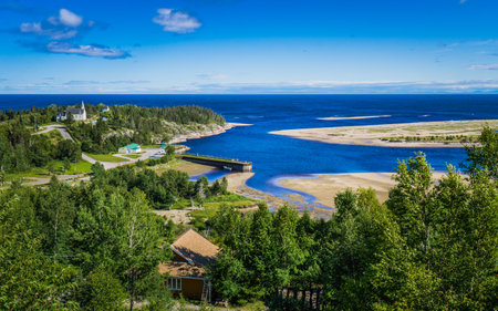 View on Riviere-Pentecote small village, quay and church from the route 138 in Cote Nord, a region of Quebec, Canadaのeditorial素材