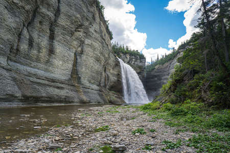 View on the Vaureal waterfall from the canyon, the most impressive waterfall of Anticosti Island, in Cote Nord region of Quebec, Canadaの写真素材