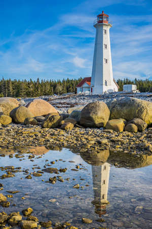 View on Pointe Nord lighthouse, a 23 meters high lighthouse also called "Cap-De-Rabast", on Anticosti island, in Cote Nord region of Quebec, Canadaのeditorial素材