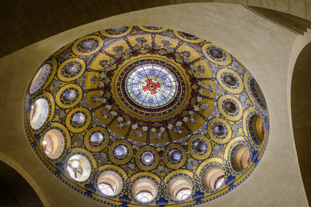 The neobyzantine golden mosaic of the cupola inside the lower Basilica (Rosary Basilica) of Lourdes in the French Pyreneesのeditorial素材