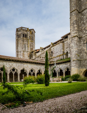 The medieval cloister and tower of the Saint Pierre collegial church in La Romieu, south of France (Gers)のeditorial素材