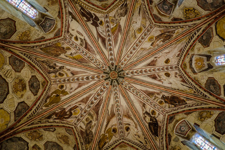 4th century frescoes on the ceiling of a chapel of the La Romieu church in the south of France (Gers)のeditorial素材