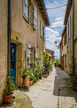 Cute, flowery and narrow streets of the small village of Lectoure in the south of France (Gers)のeditorial素材