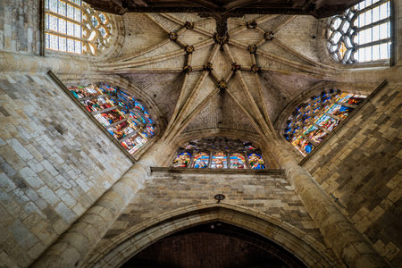 Ceiling and stained glass windows of the choir of the gothic cathedral in Condom, in the south of France (Gers)のeditorial素材