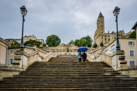 The monumental staircase and its 234 steps in Auch, in the South of France (Gers), under the rainのeditorial素材