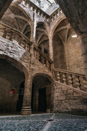 Inner courtyard of the 16th medieval townhouse of Lacoste Barons in the old town of Pezenas in the south of France (Herault)のeditorial素材