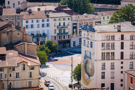 View on the Cordeliers square with its  hot-air balloom mural and the theater in Annonay, in the south of France (Ardeche)のeditorial素材