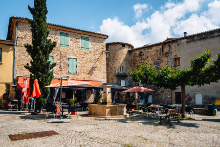 Terrace of a restaurant in summer on the main square of Boulieu Les Annonay in the south of France (Ardeche)のeditorial素材