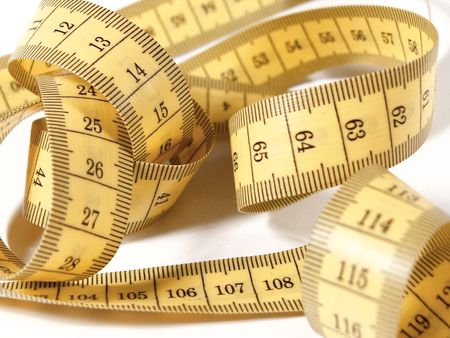 imape of a Yellow tape measure in centimeters
