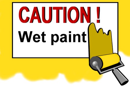 Caution - wet paint warning signの写真素材