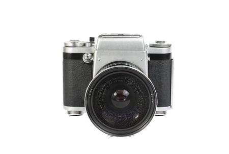 silvery-black mechanical 35mm photo camera isolated on white の写真素材