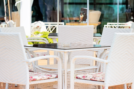 Close Up White Chairs And Table In Restaurantの写真素材