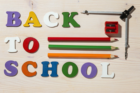 Wooden Colorful Letters Spelling Back To School And School Office Supplies. Copy Space