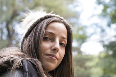 Outdoor Portrait Of Pretty Woman In Woolen Winter Hatの写真素材