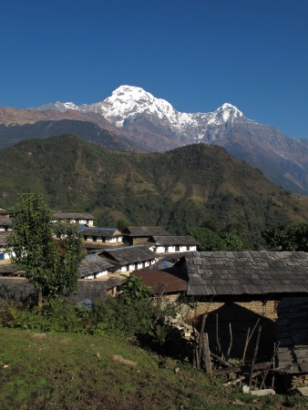 Idyllic village Ghandruk and snowcapped Annapurna Southの写真素材