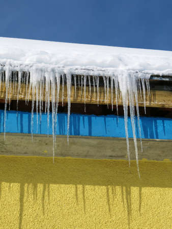 Icicles hanging on a roof