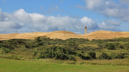 90 meter high sand dune and lighthouse at the west coast of Denmark. Rubjerg Knude.の写真素材