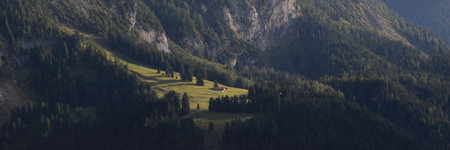 Bright lit farm in the Swiss Alps.の写真素材