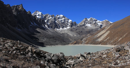 Peaks and Thonak Tsho, lake in the upper Gokyo Valley, Nepal.の写真素材