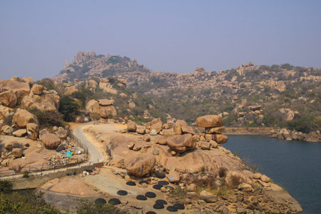 Sanapur Reservoir, artificial lake, granite boulder and  mountains, Karnataka, India.