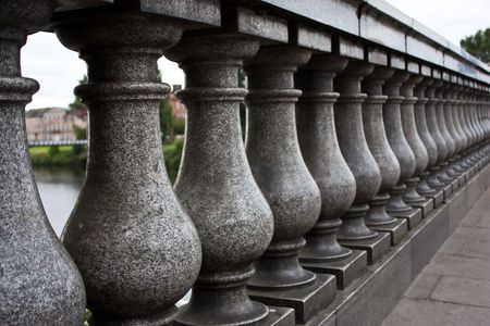 Detail of a bridge in Glasgow: columns with a limited deep of fieldの写真素材