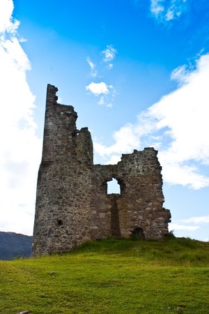 Scotland, Sutherland. Ruiner of a castle on blue sky.の写真素材