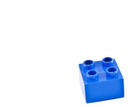 Plastic building blocks on white background. Bright colors.の写真素材