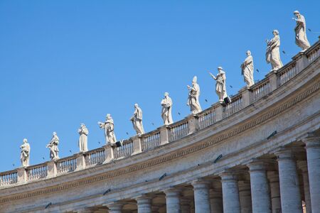 Statues in St. Peter Square (Rome, Italy) with blue sky backgroundのeditorial素材