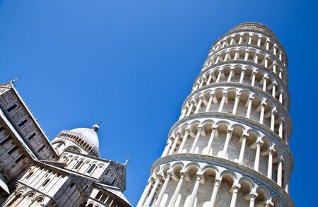 Italy - Pisa. The famous leaning tower on a perfect blue bakcgroundの写真素材