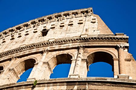 Colosseum in Rome with blue sky, landmark of the cityの写真素材