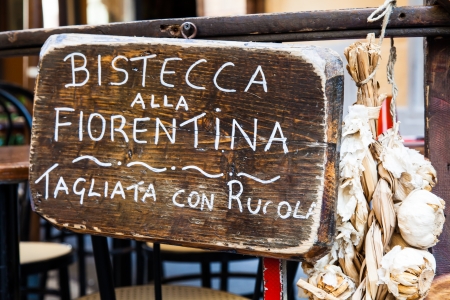 Sign made of wood with Bistecca alla Fiorentina (Florence steak) wordsの写真素材