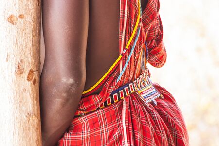 Kenya. Detail of the traditional Masai red costume.の写真素材