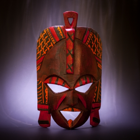 Tradional mask from Kenya (made of wood) with smoke effect useful for conceptsの写真素材