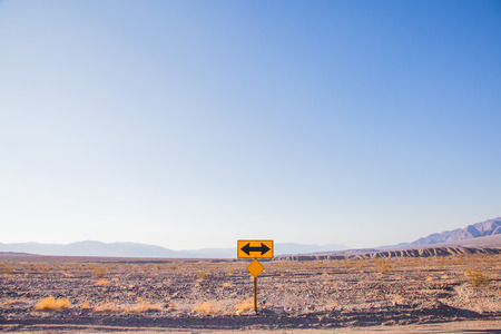 Death Valley, California. Direction sign in the middle of the desert.の写真素材