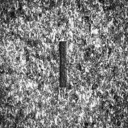 Roman numbers collection, from 1 to 7, on a real ancient graniteの写真素材