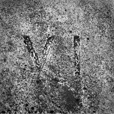 Roman numbers collection, from 1 to 7, on a real ancient graniteの写真素材