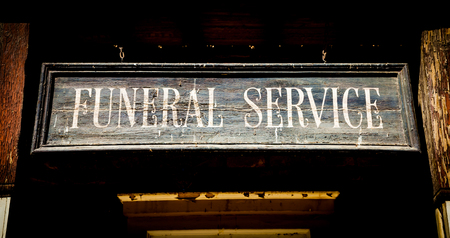 Vintage Funeral Service cartel made of wood. Good for concepts.の写真素材