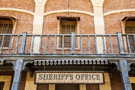Old Sheriff Office cartel, made of wood, useful for conceptsのeditorial素材