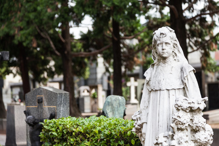 More than 100 years old statue. Cemetery located in North Italy.の写真素材