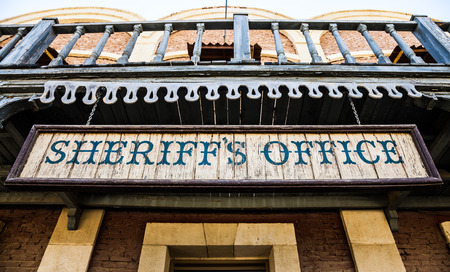 Old Sheriff Office cartel, made of wood, useful for conceptsの写真素材