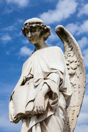 Cemetery statue in Italy, made of stone - more than 100 years oldの写真素材