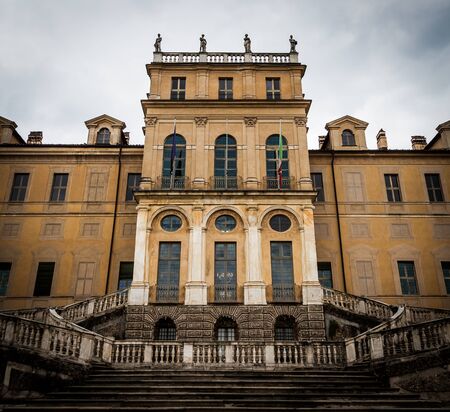 Entrance of an old semi-abandoned Italian palace in Torino, north Italyの写真素材