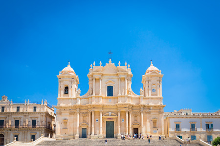 Turists in front of the most important baroque cathedral of Sicily, San NicolÃ², Unesco Heritage site, sunny dayの写真素材