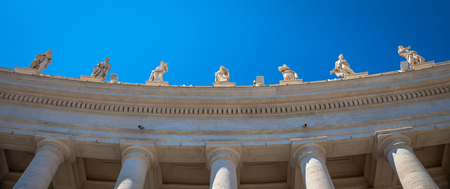 Rome, Vatican State. Details of columns of Saint Peter Square with copyspace on blueのeditorial素材
