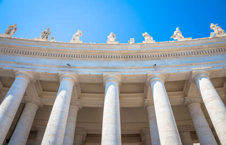 Rome, Vatican State. Details of columns of Saint Peter Square with copyspace on blueのeditorial素材