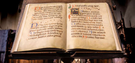TURIN, ITALY - CIRCA MAY 2021: antique Medieval manuscript with ancient calligraphy.のeditorial素材