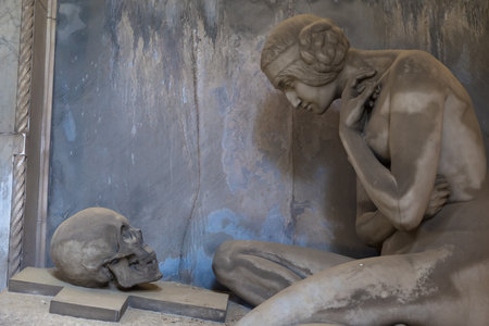 GENOA, ITALY - June 2020: antique statue, beginning 1800, made of marble, in a Christian Catholic cemetery - Italyのeditorial素材
