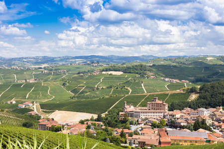 Panoramic countryside in Piedmont region, Italy. Scenic vineyard hill with the famous Barolo and...